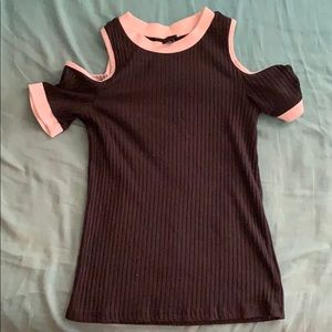 Black shirt. Open shoulder